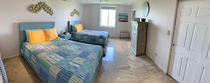 BEDROOM WITH TWO QUEEN BEDS AND JUNGLE VIEW