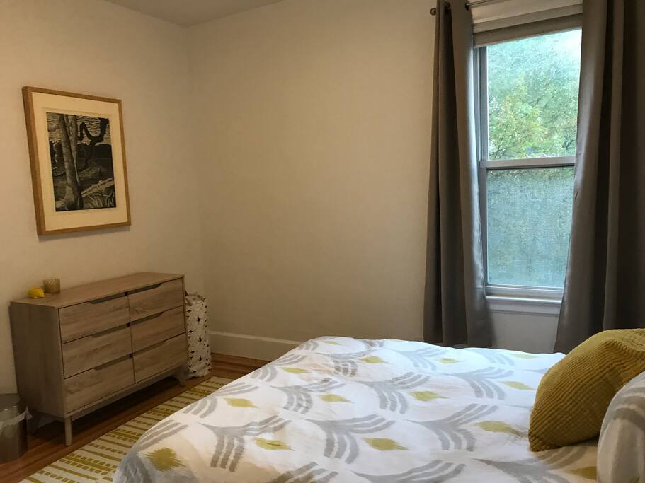 Full-sized double bed with black out curtains