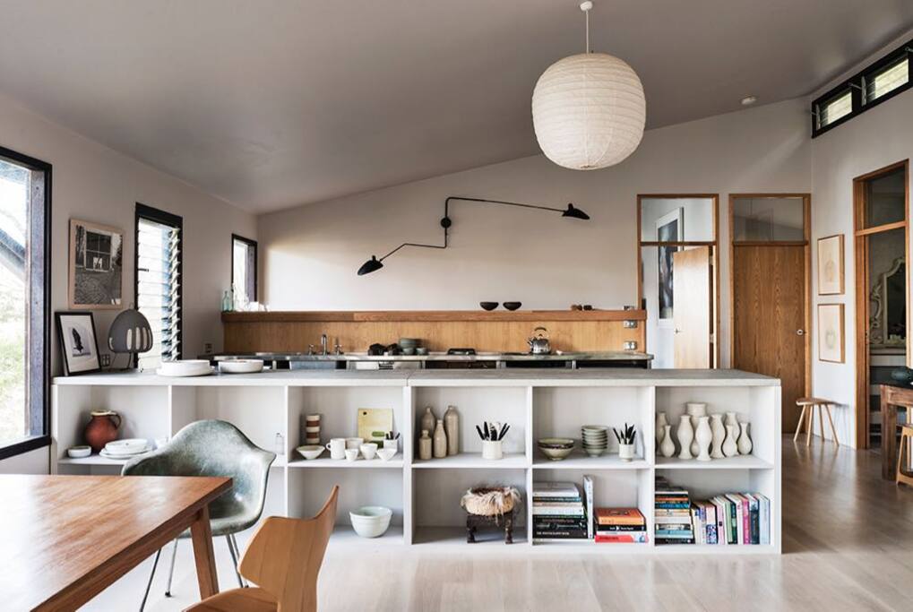 The kitchen area with bedrooms beyond