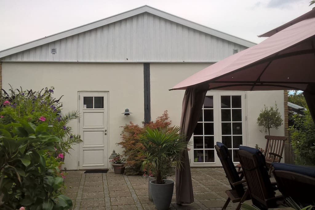 Front of house & private terrace.