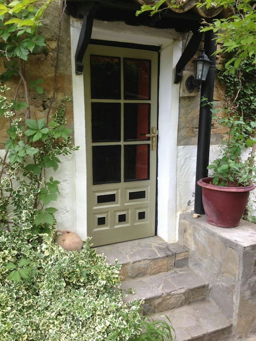 One of the two entrances to the THE BACKSTAGE RUSTIC FLAT