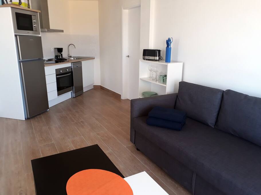 salon con zona de cocina
