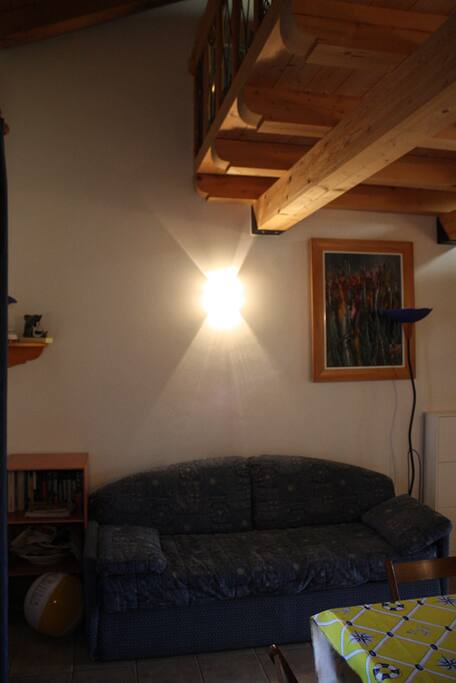 Soggiorno con divano letto
