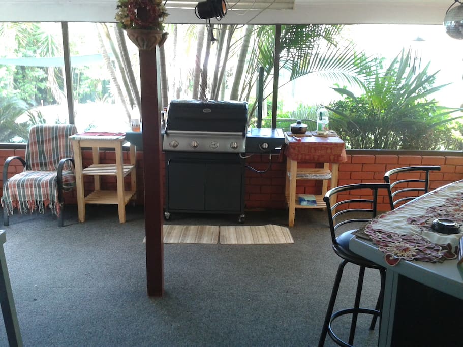 Screened in outdoor area to cook and eat on warm nights.
