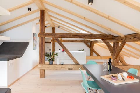 Spacious design loft in a historic farmhouse