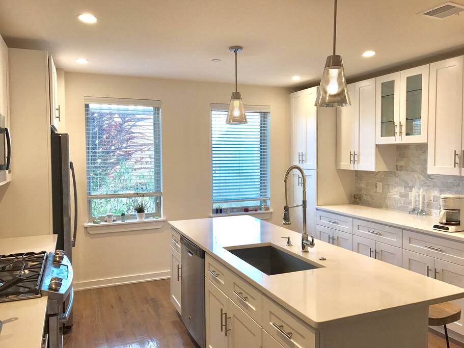Kitchen. Cook a feast or order in pizza!