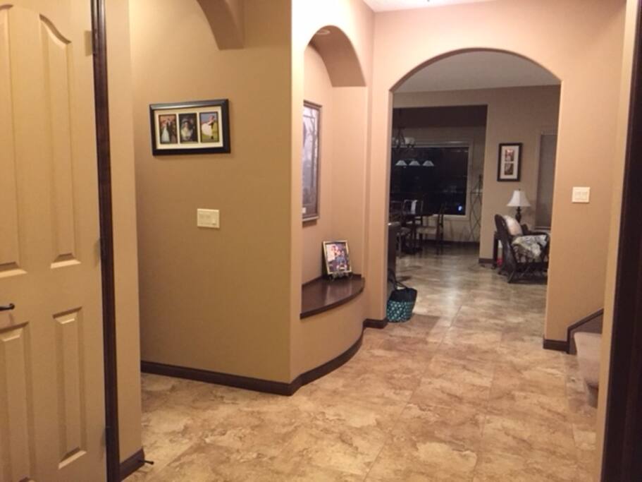 Spacious foyer with large tile throughout main floor