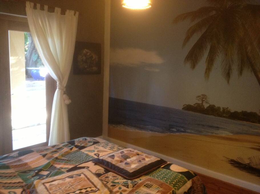 Bedroom with entry to courtyard