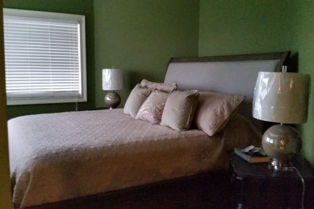 Downstairs King bed, New luxury king Hotel Collection Mattresses and Boxspring. Three large windows with an amazing view. Adjoining full bathroom.