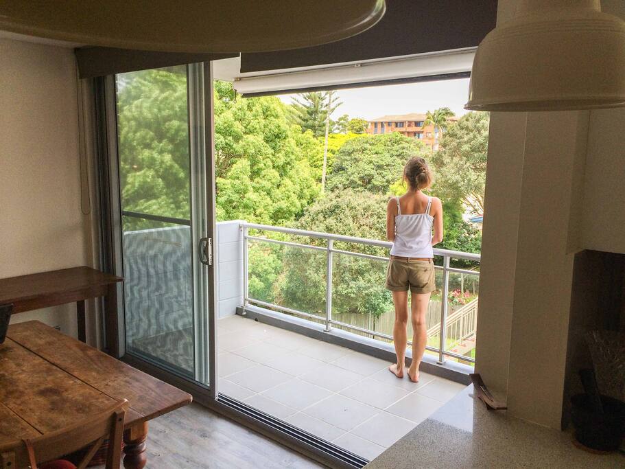 large terrace with view on greenery . quiet and perfect for breakfast