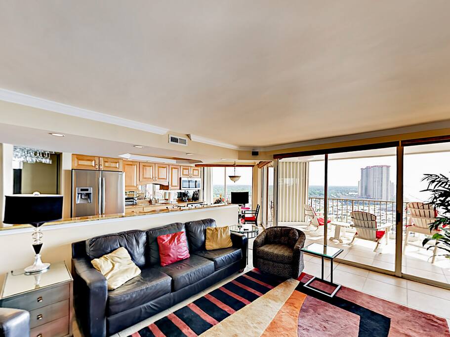 Take in sweeping ocean views from the sofa and armchair in the living room.
