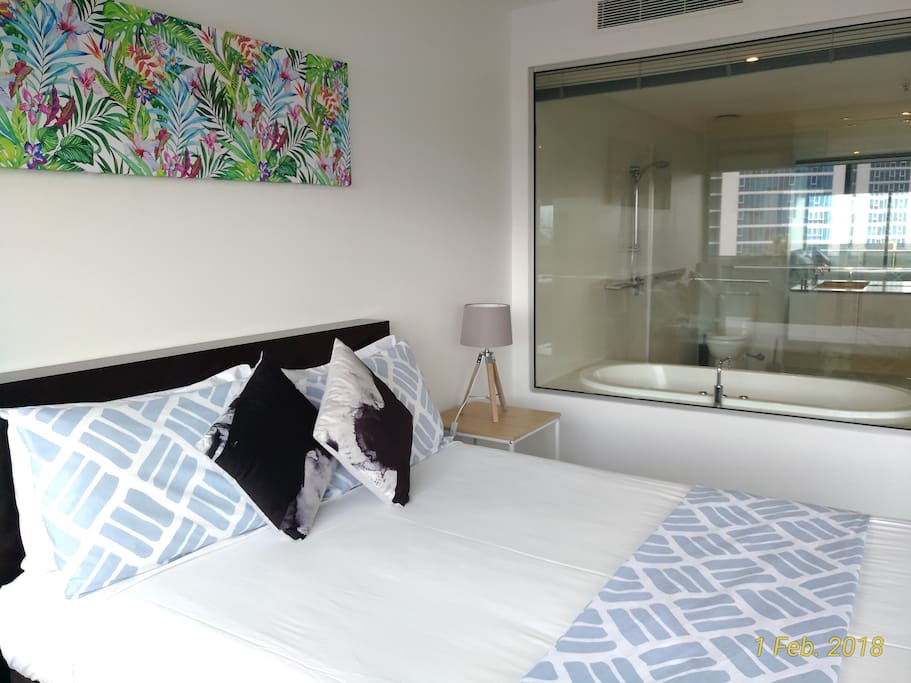 Master bedroom with open view spa bathroom