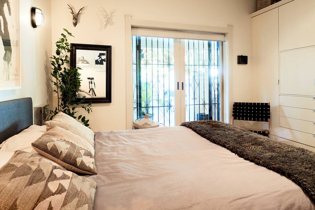 Bedroom with TV, Apple TV, Netflix, Stan and lots of cupboards and drawers