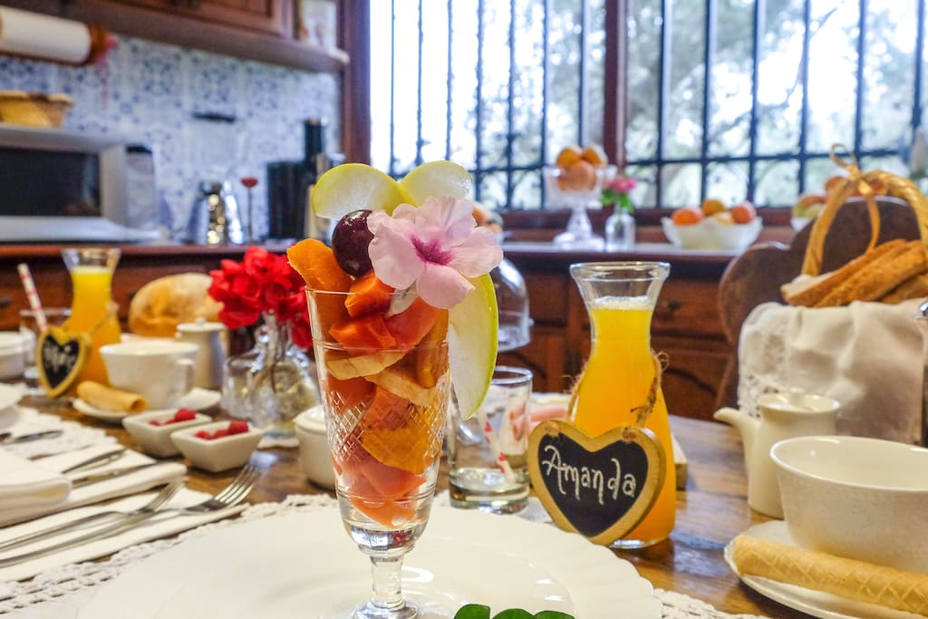 Freshly cut fruit salad with only the best, organic fruits of the season and freshly squeezed 100% pure orange juice