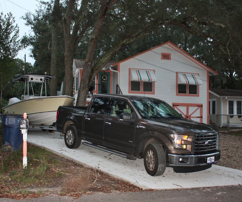Pull thru concrete drive allows truck and trailer parking