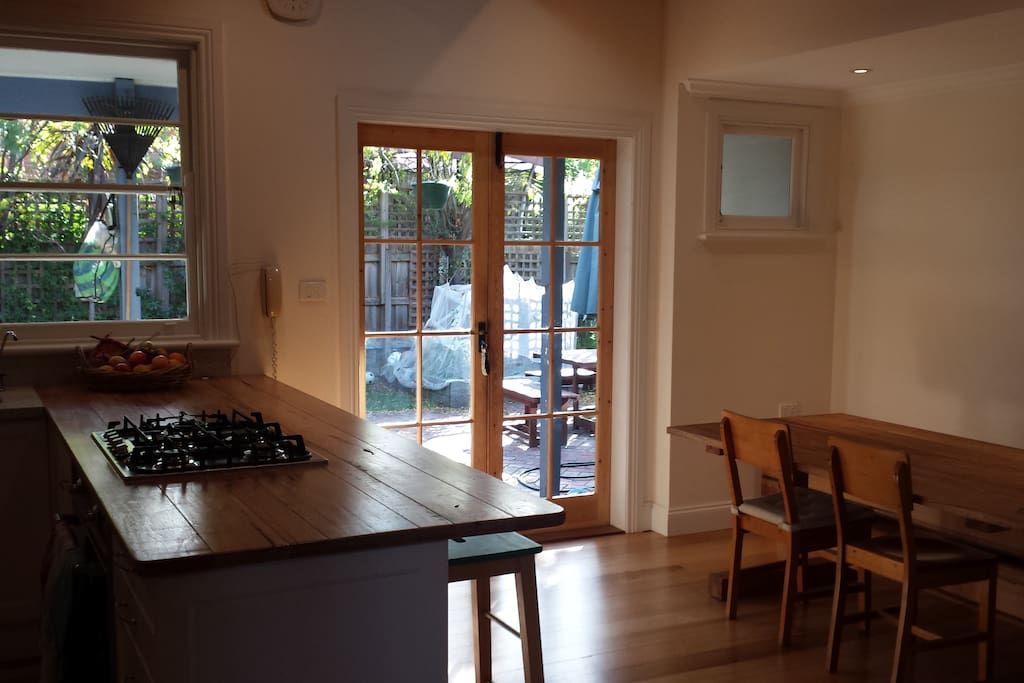 French windows lead into the back garden. Kitchen table that seats 8 people.