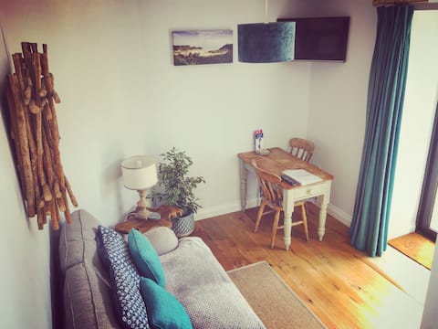 Popular Airbnb listing: Sea View & Hot Tub in a Coastal Cottage Annexe in Swansea
