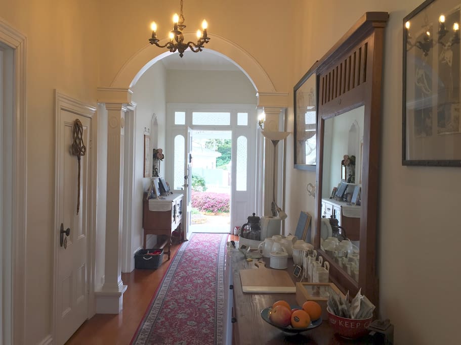 Chelsea House hallway with many ornate features in this 100+yr old home