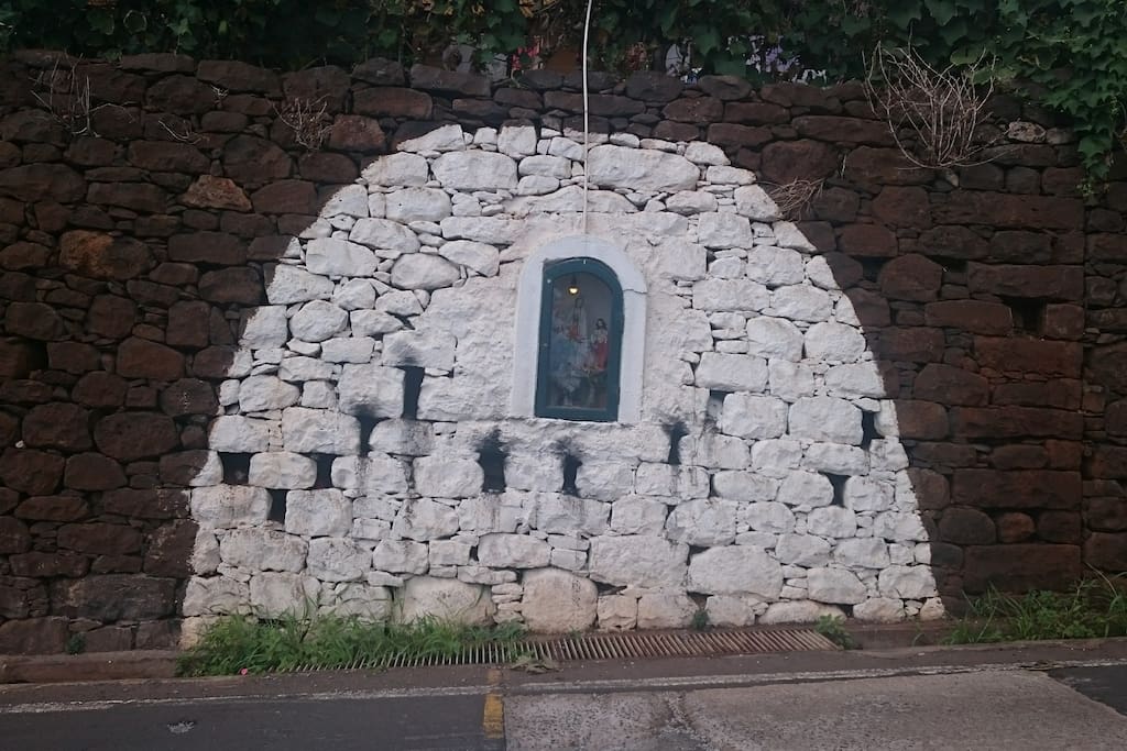 Landmark of Santinha in the Wall on main road
in front of house