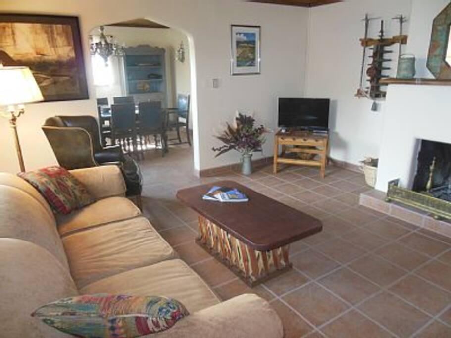 Living room. Seating for six. SW tiled floors throughout.