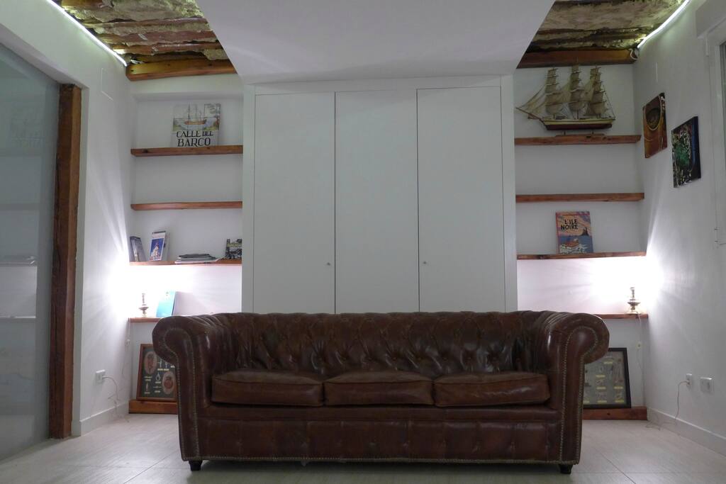 Chesterfield sofa and shelves