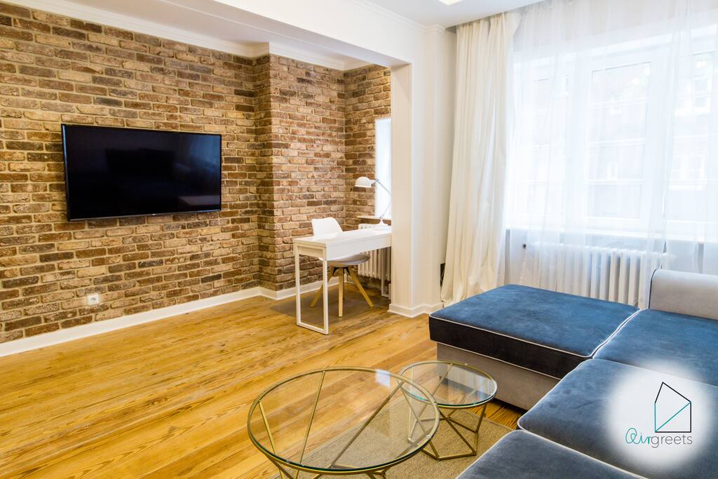 Enjoy the cable TV lying cozily on the sofa.