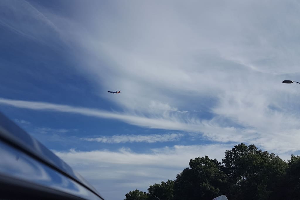 LaGuardia Airport can be seen from my rooftop. 8 mins away in taxi.