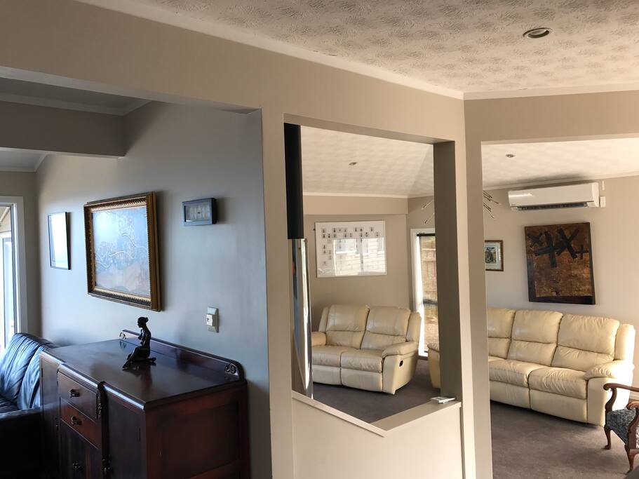 Lounge room connecting to front and rear decks with sea views ❤️