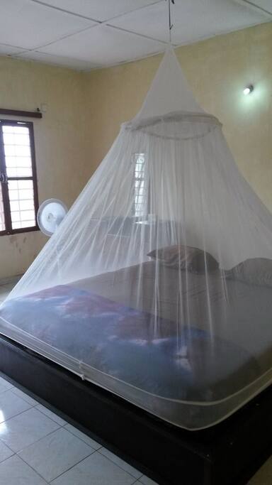 double bed, with new nets and fan