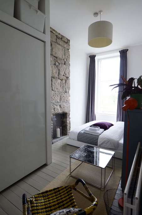 Ensuite guest bedroom with west facing with views to the park.