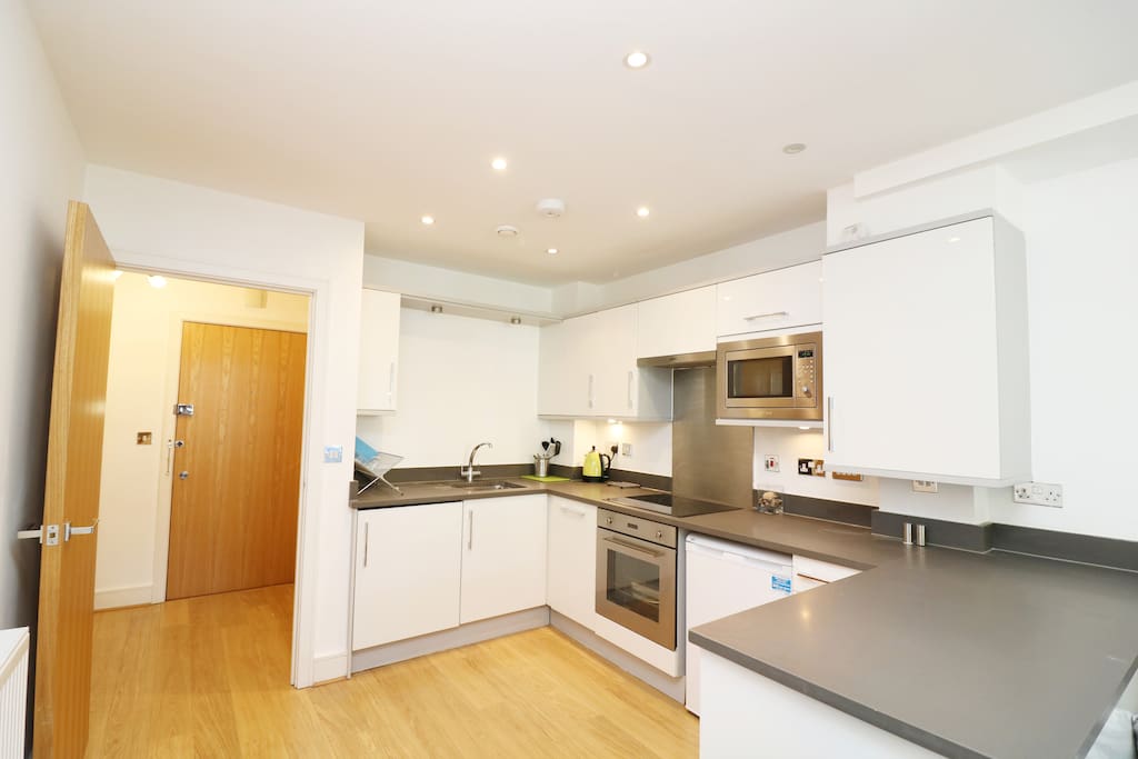 Fully fitted modern kitchen with 2 under the counter fridges