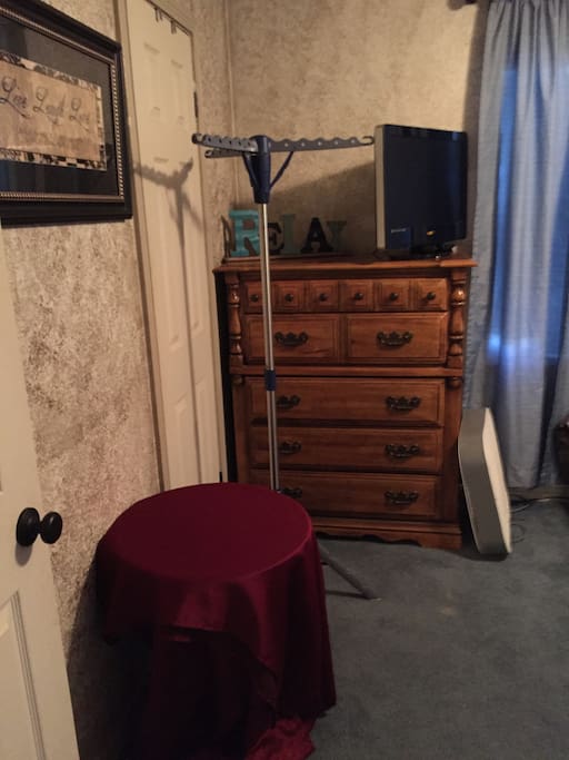 TV and storage in guest bedroom.