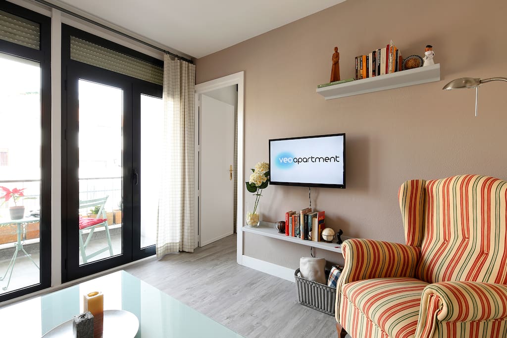 Living room. Large glass doors open out to the first balcony.