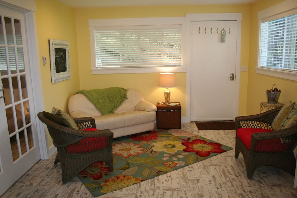 The living area reflects the warm garden spirit.