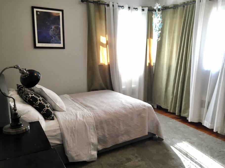 This is the second bedroom with a full size bed .