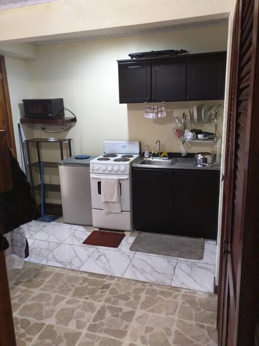Kitchenette. There is a rice cooker in the cupboard.