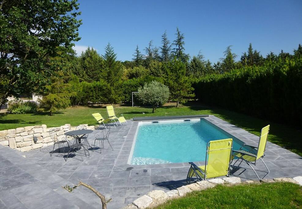 The Pool and sun terrace, set in the lawn.