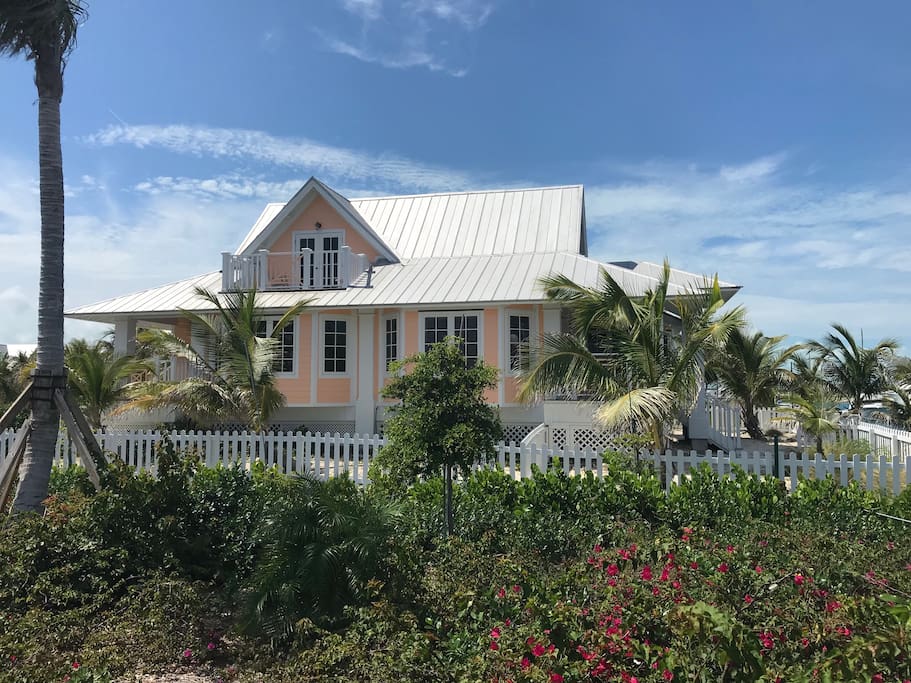 Front and exterior porches, as well as a second-story balcony provide panoramic views of the marina and ocean.