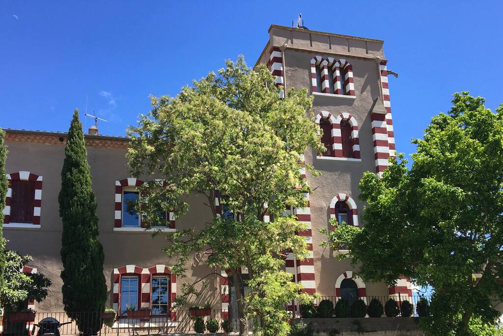 View of the chateau tower from the parking area (the entrance)