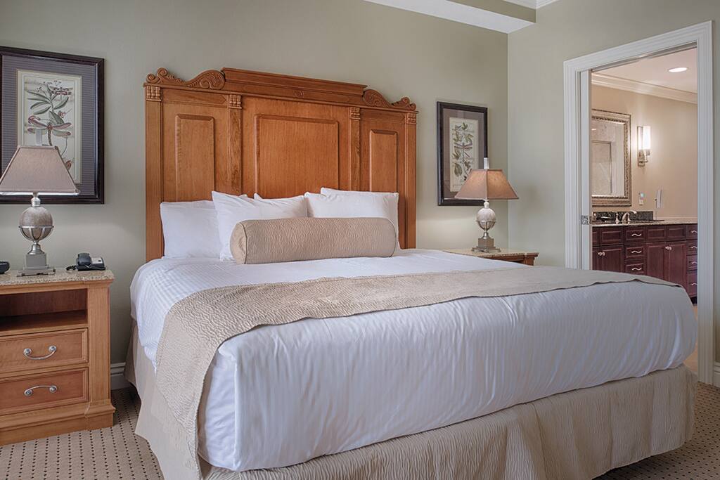 Master Bedroom with King Size Bed. Please note that layout and decor varies.