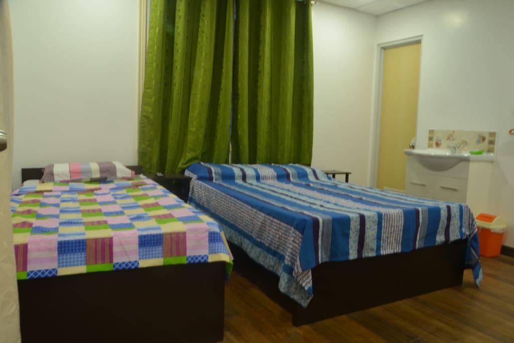 Room 3 - 2nd floor can accommodate 3 guests. 1 single bed, 1 double bed.
