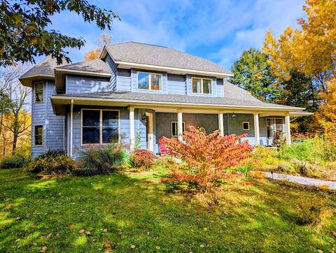 Stunning Waterfront Country Home in the Woods