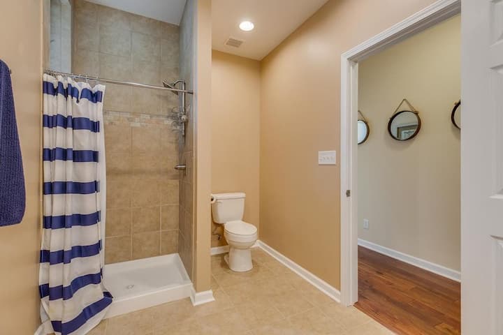 Downstairs bedroom 2 private bath with walk in shower