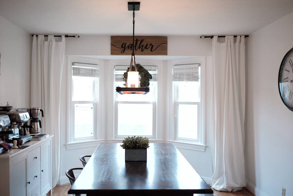 Dining room just off from the kitchen and living room, complete with espresso machine, manual brew bar, and automated coffee
dripper.