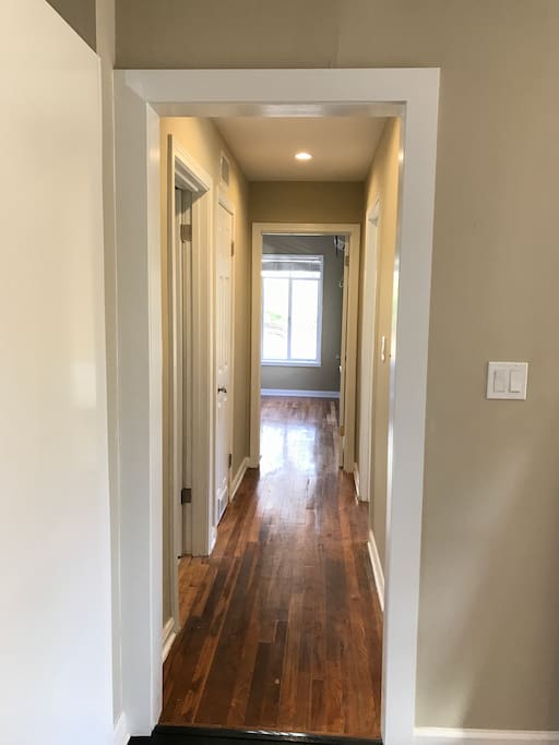 Hallway to bathroom and bedrooms.
