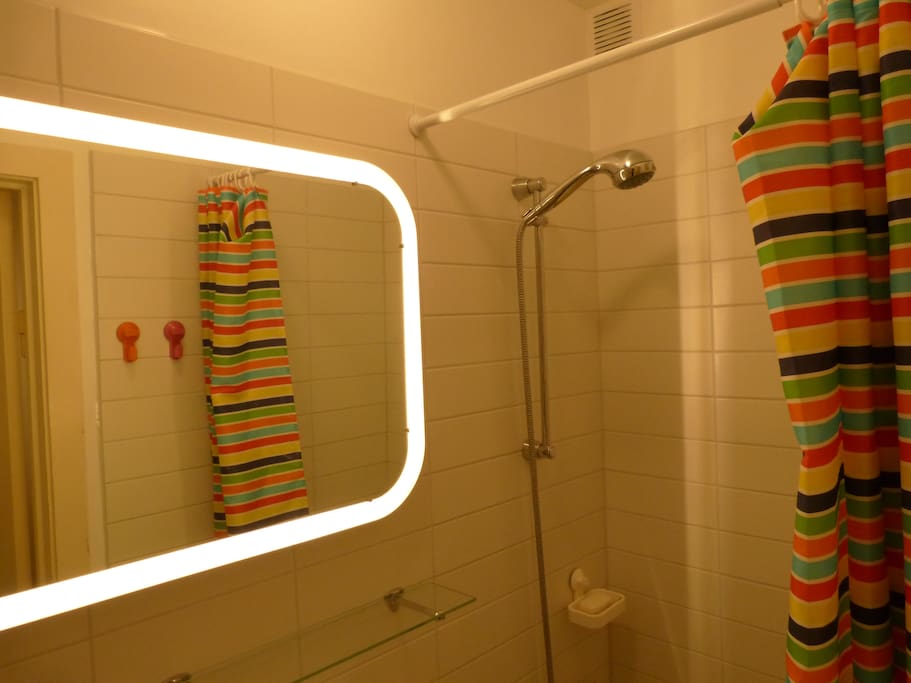 Shared bathroom with shower.