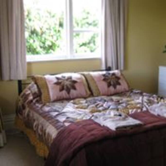 The double (queen-sized) bedroom.
