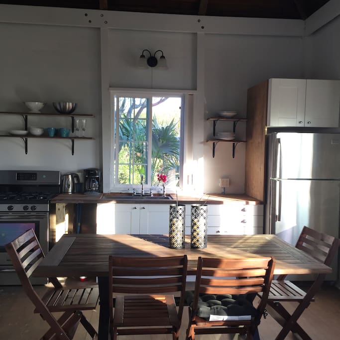 Kitchen showing inside dining area
