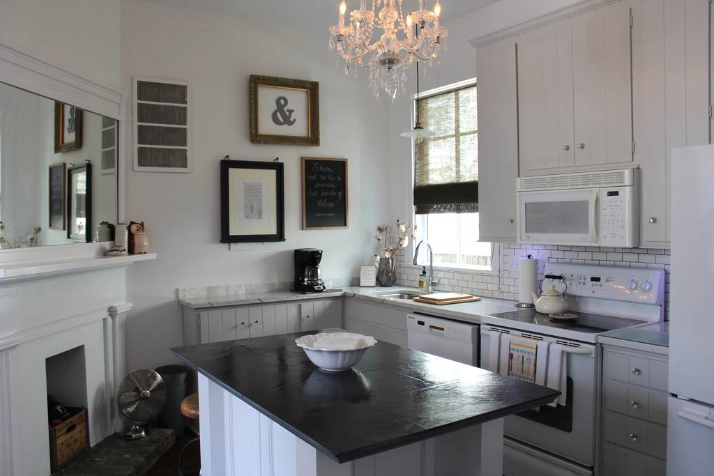Kitchen is fully stocked for cooking. Dining Island for eating meals in-house.