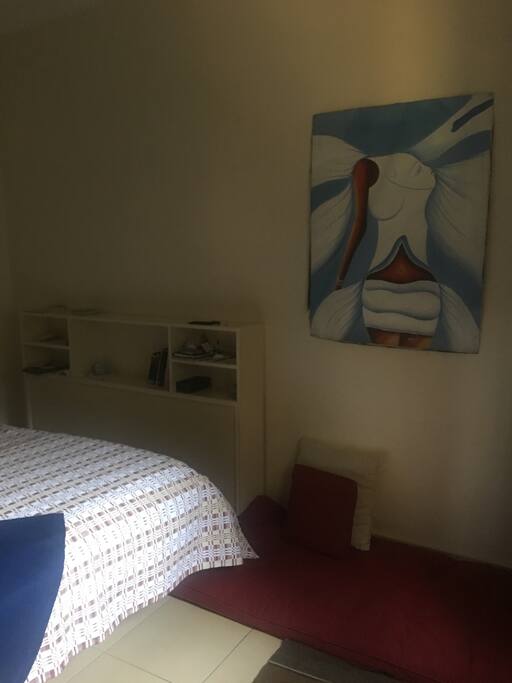 Sunset room head side shelves